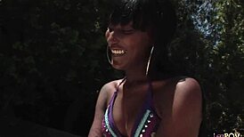 Two skinny ebony and brunette lesbians lick shaved pussies poolside on sofa?