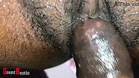 A beautiful african woman enjoys detailed close-up intimate action