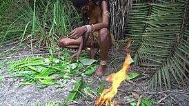 wanna see this hot african native's small waist while she cooks outdoors in jungle?