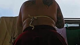 hey, this naughty maid flashes her big ass from the balcony skirt up