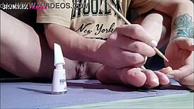 Sexy Brazilian paints toenails flashing shaved pussy clit toes close-up to tease