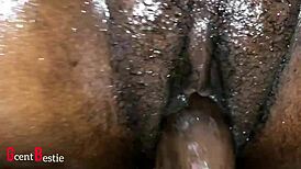 A beautiful african woman enjoys detailed close-up intimate action