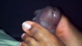ebony babe strokes black cock with her sexy feet