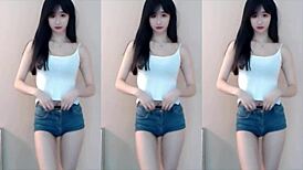 hey this cute chinese girl dances sexy on the wild coaster