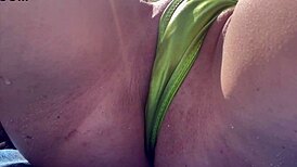 Horny Italian milf flashes tight shaved pussy at Miami public beach