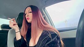 artemisia love's big tits smoke session in car with long hair