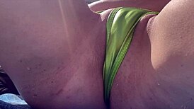 Horny Italian milf flashes tight shaved pussy at Miami public beach