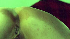 porno slut bends over as gloved fist stretches her pussy and ass wide open