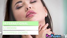 Li Moon strips teasingly posing her petite natural body for Playboy.