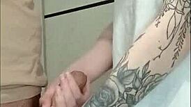 Stepmom's friend grips and strokes cock at house party