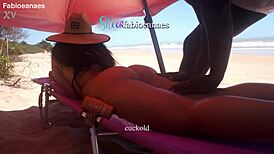 ebony gives beach massage to curvy married latina then anal fingers her ass