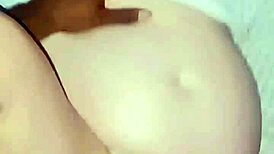 studio shoots chubby milf slipping panties aside for the shot