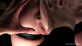 bdsm device binds blonde tight for cum-soaked bondage play