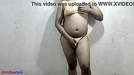 Homemade Indian shemale crossdresses micro bikini shakes big tits ass