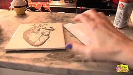 Photo shoot escalates when brunette beauties finger wet pussies and kiss in lesbian softcore play