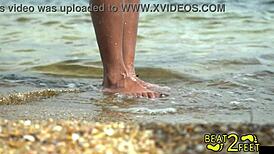 giggles soaks her feet at the beach behind the scenes on beat2feetcom