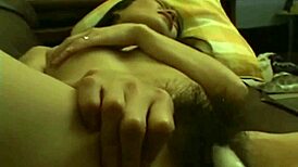 I'm the petite Asian babe toying my hairy pussy